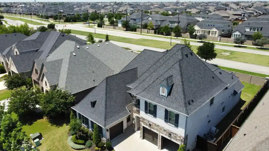 Drone photograph of a Frisco residential roof and surrounding North Texas neighborhood used for Frame Restoration's Frisco roofing guide