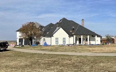 Completed residential roof installation by Frame Restoration in Frisco, Texas